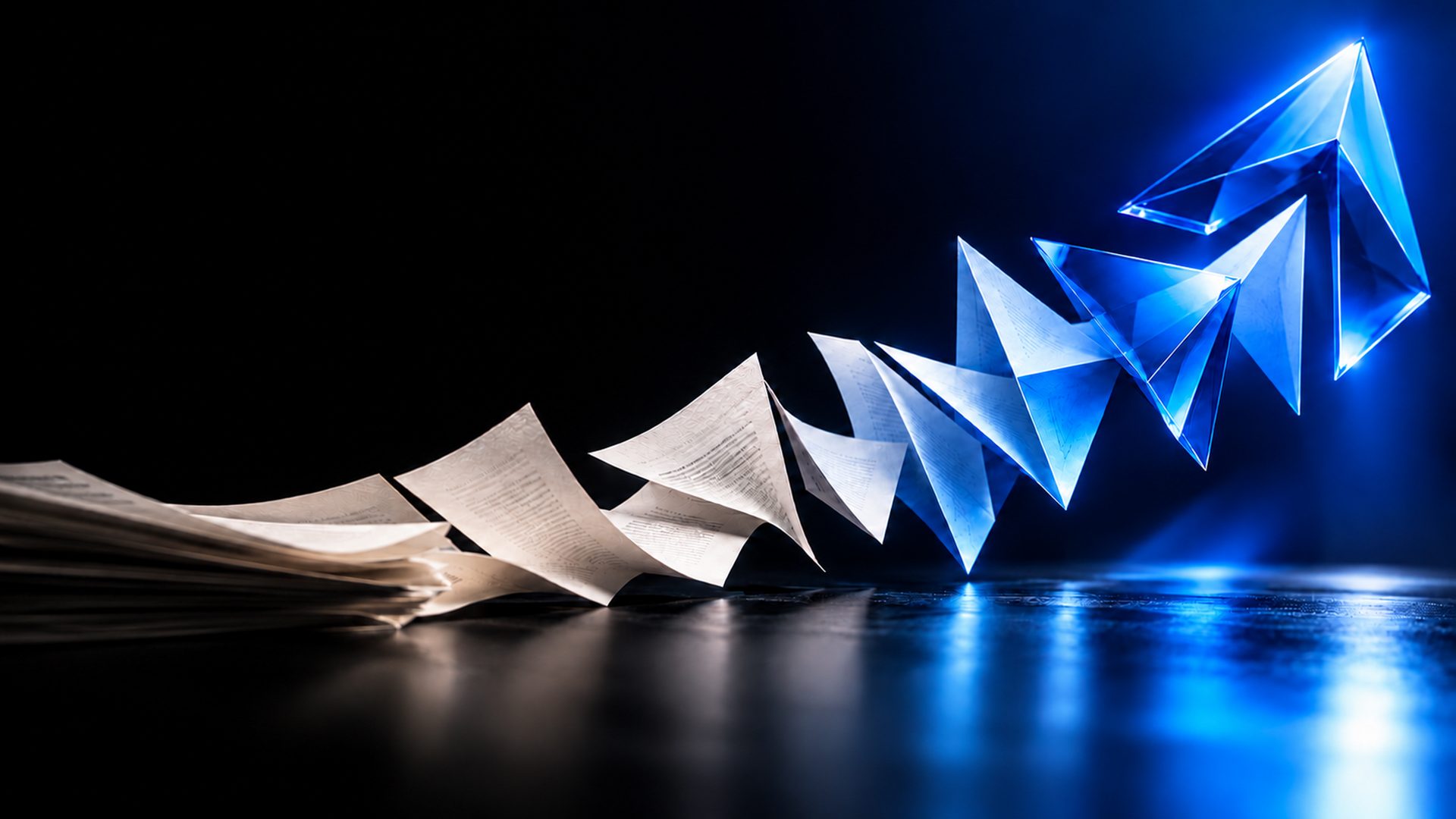 Printed pages lifting and folding into a cobalt chevron. Illustrative image.